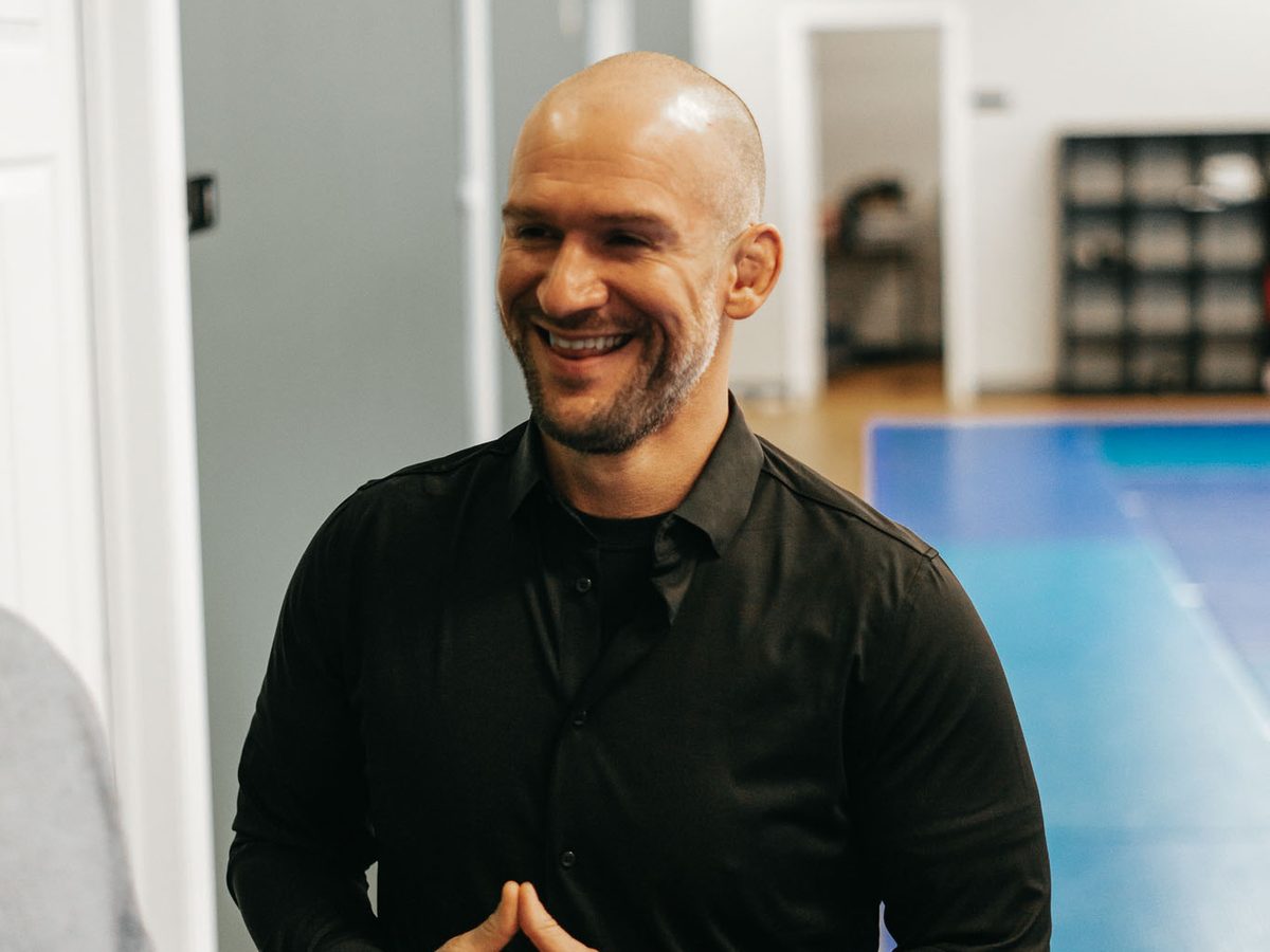 Chris Matakas smiling in the academy