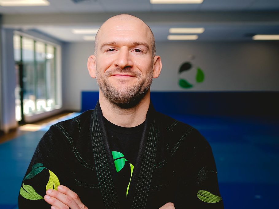 Chris Matakas smiling in his gi at the academy