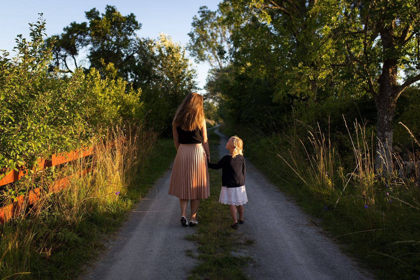 Mother and Child walking down path